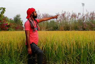 Man in field - Uganda's Hepatitis Burden